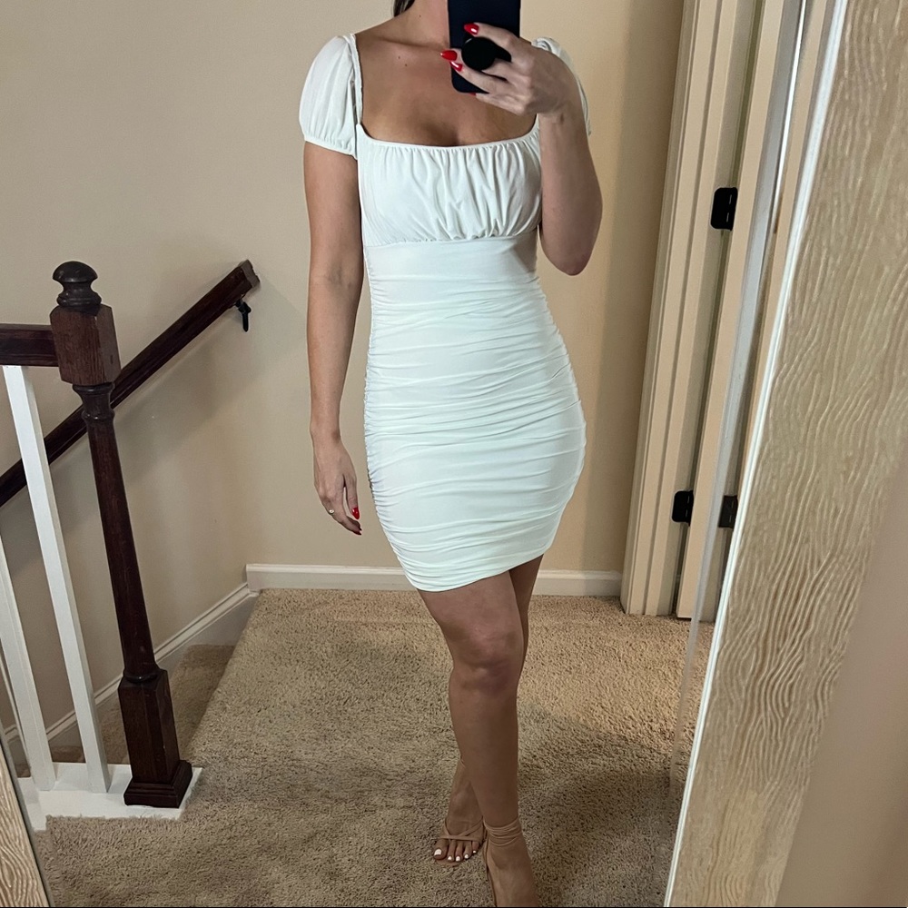 White mini dress size US 4. Club Beach brand.